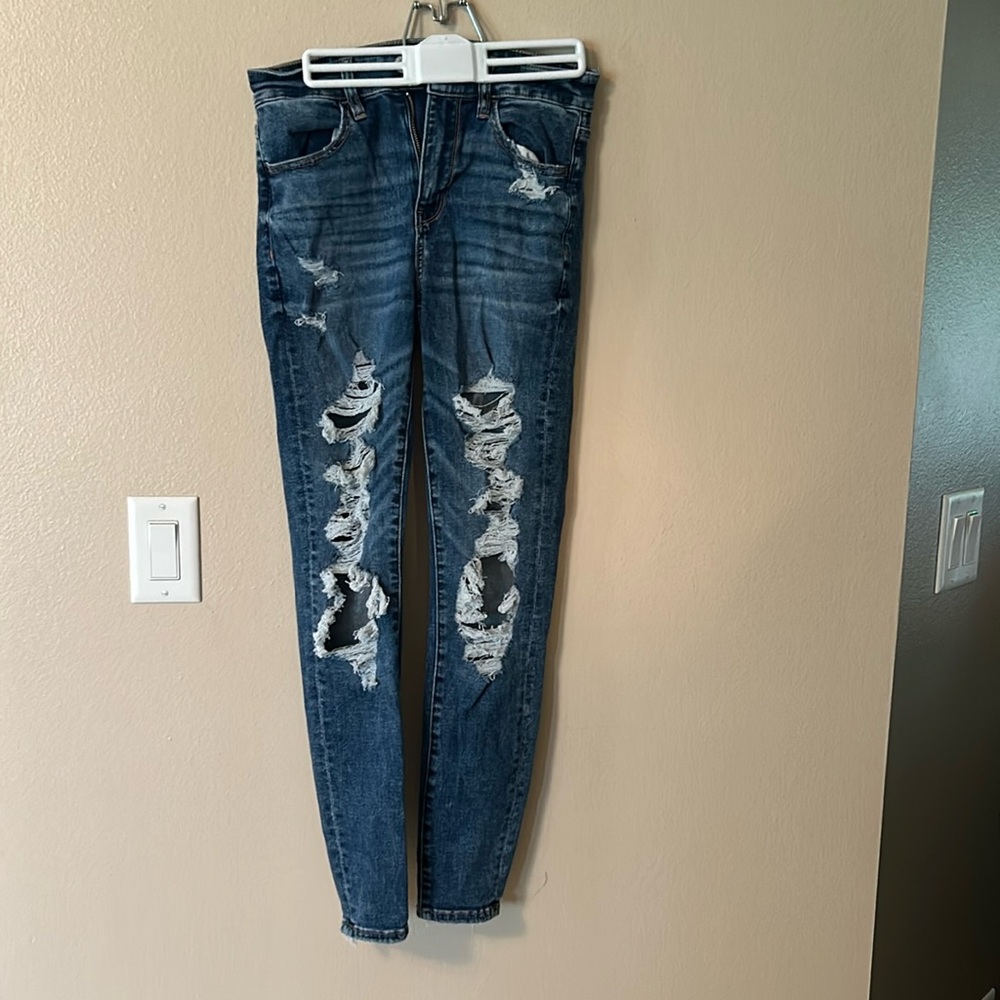Ripped blue jeans